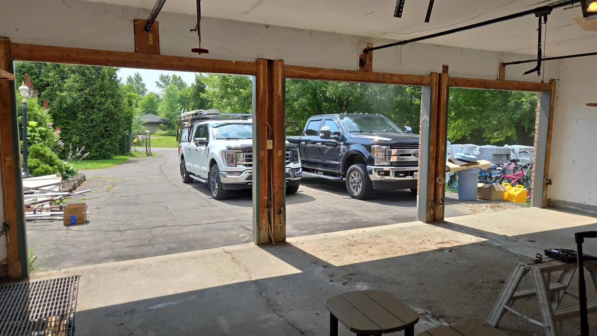 Charcoal raised-panel double garage door on brick Ottawa home, installed by Liftime