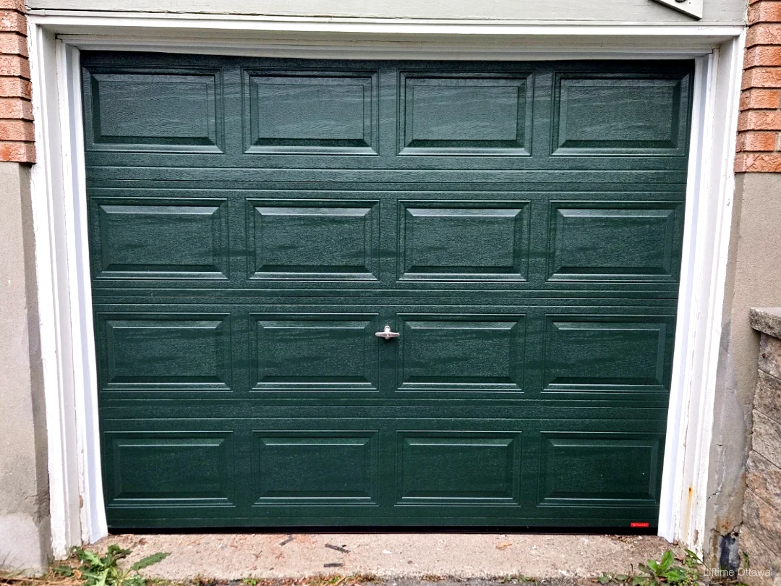 TOHO Classic 300 garage door in deep evergreen, installed by Liftime in Ottawa