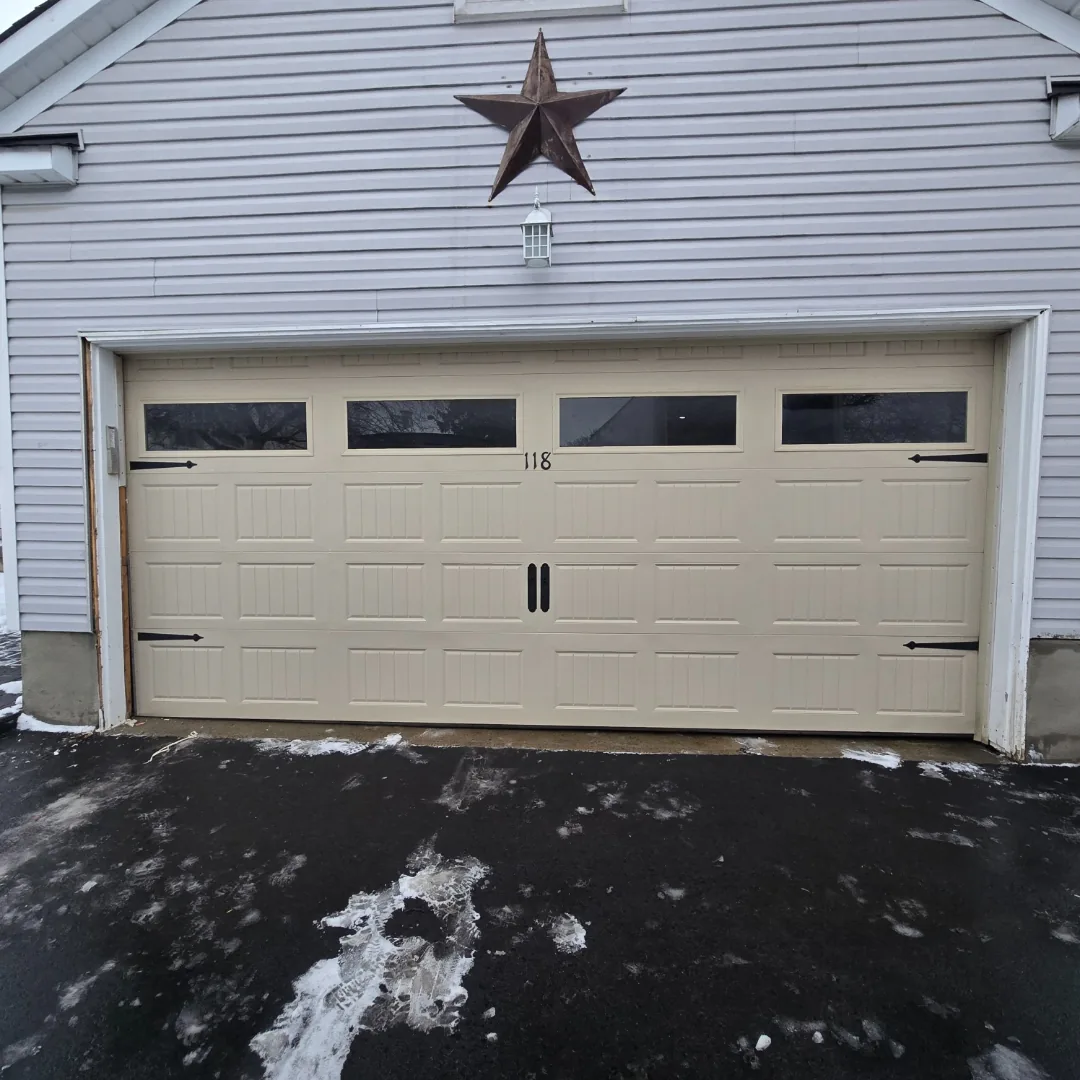White modern flush garage door on brick Ottawa home, installed by Liftime