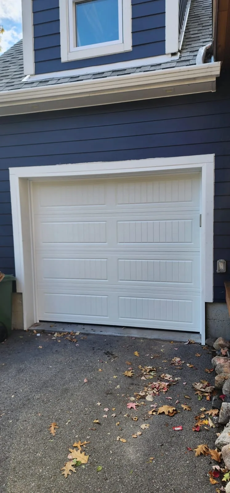 TOHO Carriage 600 white 8x7 garage door installed by Liftime Ottawa