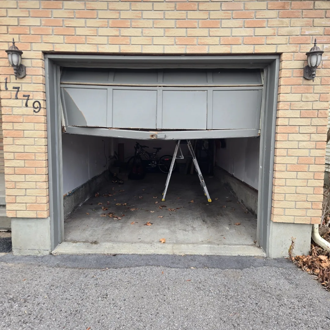 Brown raised-panel garage door installation by Liftime Ottawa