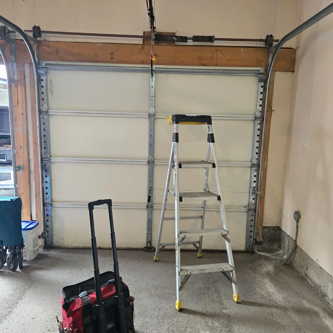 Garage door torsion spring repair in Nepean