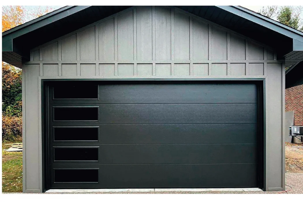 TOHO Flush 800 garage door — completely smooth flush surface with no panels