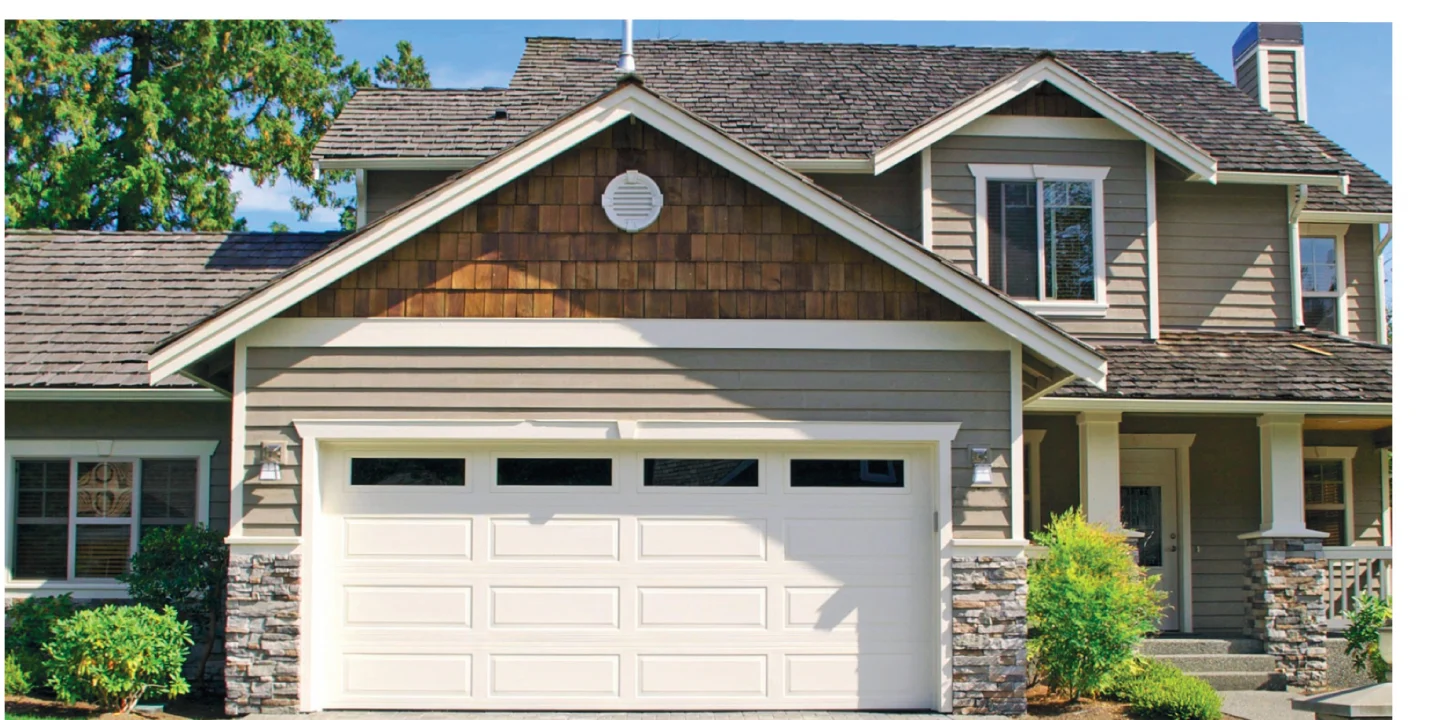 TOHO Heritage 500 garage door — long horizontal raised-panel with optional top-row windows